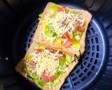 A picture of step 7 of Air fryer baked Szechwan brown bread pizzas.