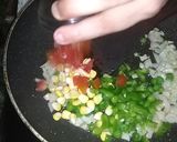 A picture of step 5 of Cheesy chilli potato cups.