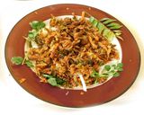 A picture of step 4 of Thool Pakoda- Onion Pakoda.