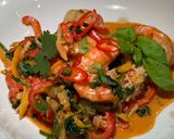 A picture of step 9 of Thai coconut curry with prawns.