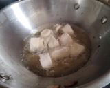 A picture of step 2 of Awadhi biryani layered with soya chaap.