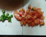 A picture of step 2 of Fish head curry with tomato.