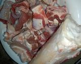 A picture of step 1 of Aloo Gosht.