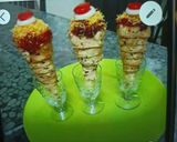 A picture of step 13 of Spicy Papad cone chaat.
