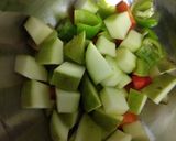 A picture of step 3 of Mix Spicy-Tangy Pickle.