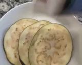 A picture of step 1 of Fry eggplant with rice and black beans.