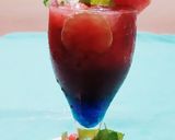 A picture of step 1 of Watermelon Mojito with blue Curacao.