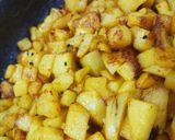 A picture of step 5 of Chatpata cubes potatoes.