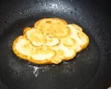 A picture of step 8 of Malpua with rabdi.