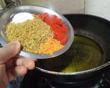 A picture of step 2 of Kacche aam ki khatti meethi chutney.