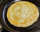 A picture of step 4 of Cheesy paratha roll🌯.