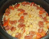 Foto del paso 4 de la receta: Arroz rojo con garbanzos y chorizo