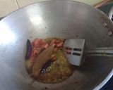 A picture of step 7 of Basanti kadhi pakodas.