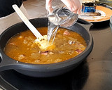 Foto del paso 7 de la receta: Arroz con calamares de lata