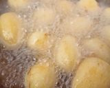 A picture of step 1 of Small Potato Curry (Bateti nu rasa valu shak).