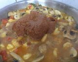 A picture of step 10 of Prawn & Mushroom Xacuti.