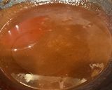 A picture of step 3 of Choco Biko with white coconut shreds and toasted coconut.