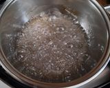 Foto del passaggio 14 della ricetta Semisfere con mousse al mascarpone e gelèe di fragole