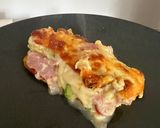 Foto del paso 4 de la receta: Budín de zucchini, tomates, jamón y quesos