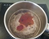 A picture of step 1 of Herbal Spiced Orange Tea.
