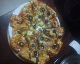 Foto del paso 2 de la receta Pizza doble jamón, aceitunas negras, cebolla frita y tomate seco