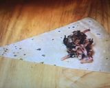 A picture of step 5 of Chicken mussakhan roll.