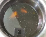 A picture of step 2 of Gur Gajar ke meethe chawal/ (Sweet Jaggery Carrot Rice pudding).