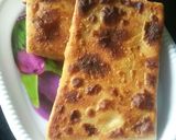 A picture of step 6 of Mughlai paratha with egg.