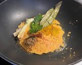 A picture of step 4 of Squid Curry Stuffed with Tofu and Egg.