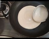 A picture of step 3 of Roti\Chapati \Phulka with liquid dough.