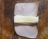Sajttal, sonkával és baconnel töltött rántott karaj recept fázis 2 fotója