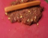 A picture of step 2 of Bacon wrapped venison dawgs.
