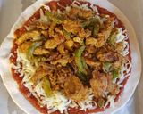 A picture of step 12 of Completely homemade chicken madras pizzas.
