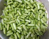 A picture of step 2 of Barbati Tomato Kura or Yard Beans with tomato.