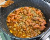 A picture of step 8 of Mini Pork Sausages with Red Pesto, Garlic, Onion, and Oregano.