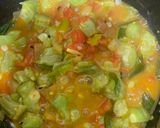 A picture of step 5 of Turaii (Ridge gourd) with kalonji and curry leaf.