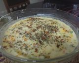 A picture of step 6 of Potato baked dish with garlic bread.