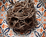 Foto del paso 5 de la receta: Spaghetti nero di seppia con salsa picante de calabaza y soja texturizada