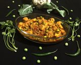 A picture of step 8 of Aloo Gobi Matar.