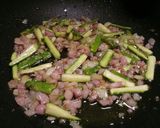 A picture of step 1 of Fresh pasta with asparagus and pancetta.