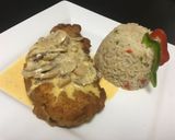 Foto del paso 5 de la receta: 🍗Milanesas de pollo en salsa de limón y hongos con arroz pilaf