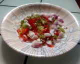 A picture of step 1 of Steamed Rice Grits (Dambun Shinkafa) with Pepper and Onion Sauce.