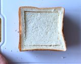 A picture of step 2 of Pocket pizza toast.