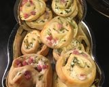 A picture of step 6 of Ham and pickle crescent pinwheels.