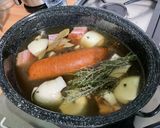 A picture of step 13 of Cabbage Stew with Smoked Sausage, Bacon, Carrots, and Turnips.