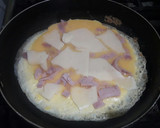 Foto del paso 3 de la receta: Omelette de arroz con queso y jamón