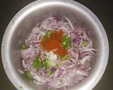 A picture of step 1 of Onion Pakoda.
