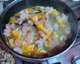 Foto del paso 11 de la receta Dorada y gambas con cebollas confitadas a la Canela y pasas