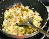 A picture of step 1 of Creamy Herbed Potato Garlic Soup or Cream of Potato Soup.