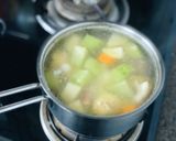 Hình bước làm 3 của món Canh Giò Heo Nấu Bắp Khoai Tây